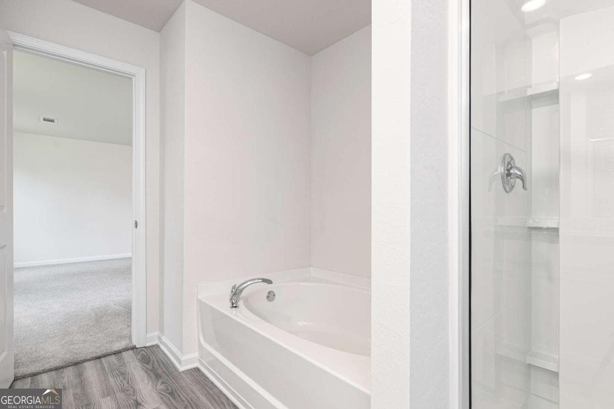 4 bedroom, 2.5 bathroom, 2,384 sq ft single family residence for sale at 393 Sand Dune Way, Conyers, GA 30013 — photo 3