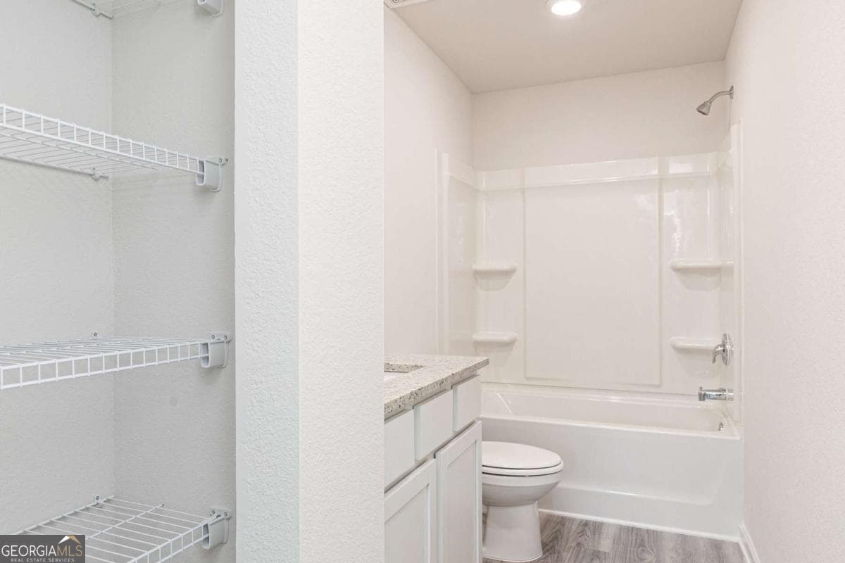 4 bedroom, 2.5 bathroom, 2,384 sq ft single family residence for sale at 393 Sand Dune Way, Conyers, GA 30013 — photo 4