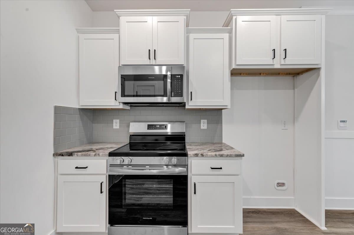 3 bedroom, 2.5 bathroom, 1,643 sq ft single family residence for sale at 146 Chaucer Lane LOT 74, Carrollton, GA 30117 — photo 4