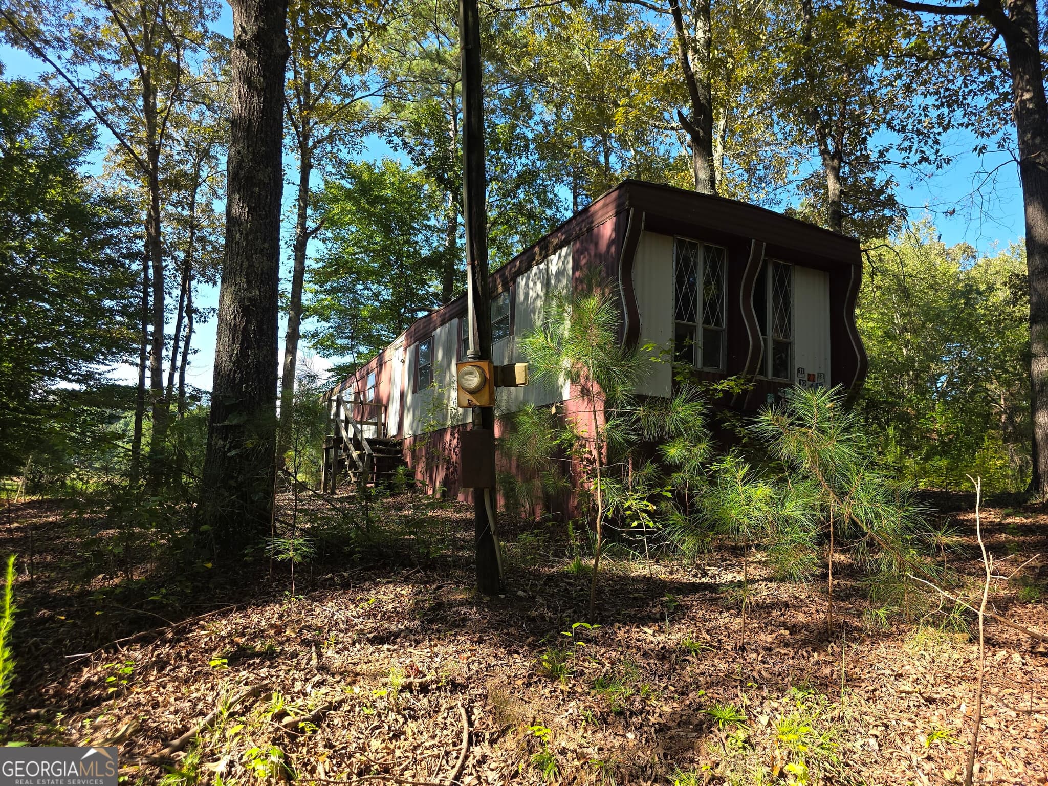 8 bedroom, 4 bathroom, 720 sq ft manufactured home,single family residence for sale at 3585 Old Hwy 100, Tallapoosa, GA 30176 — photo 3