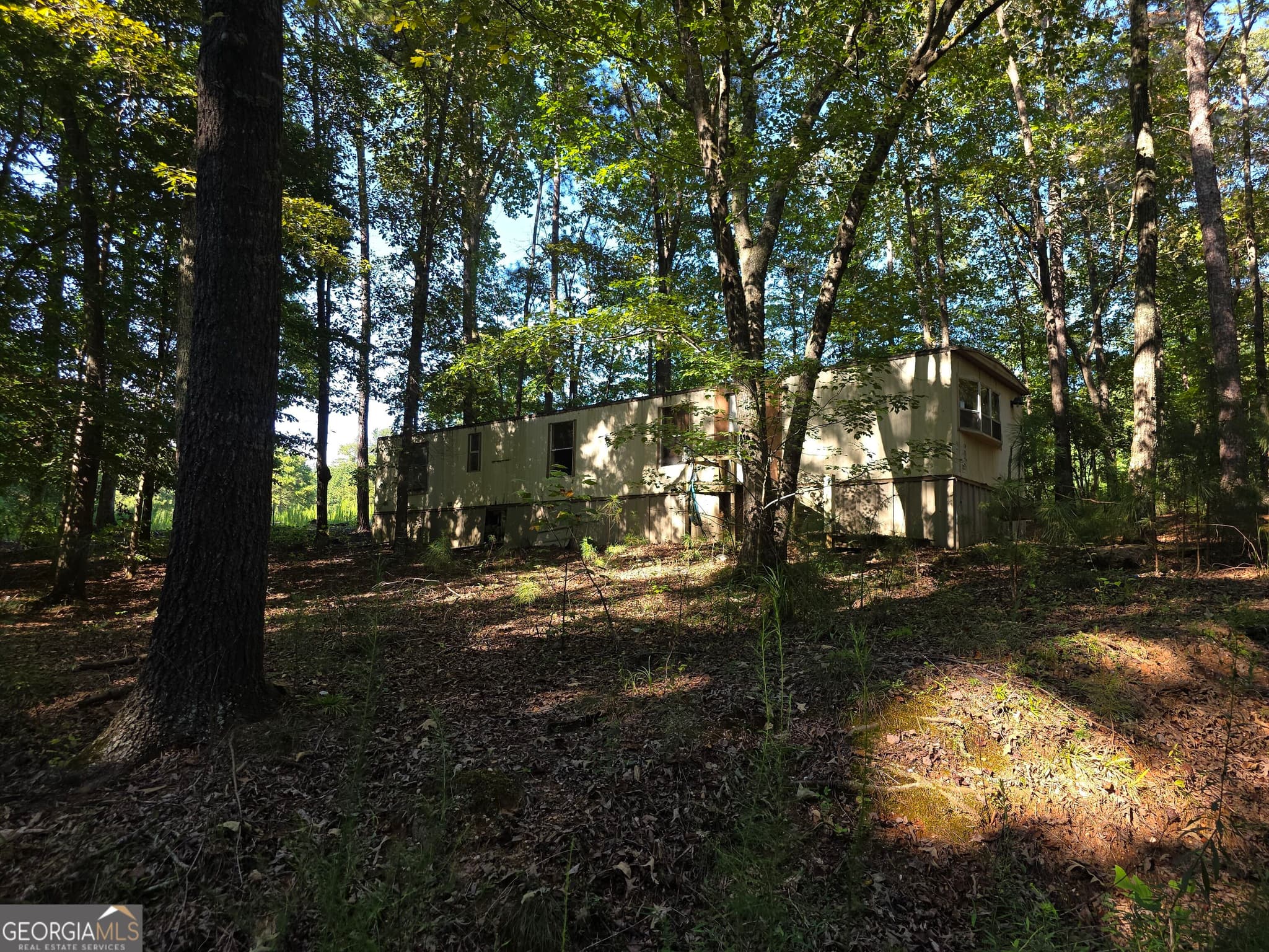 8 bedroom, 4 bathroom, 720 sq ft manufactured home,single family residence for sale at 3585 Old Hwy 100, Tallapoosa, GA 30176 — photo 4