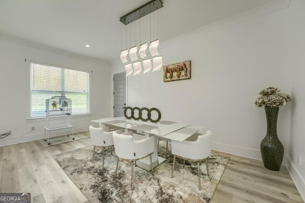 6 bedroom, 5 bathroom, 3,543 sq ft single family residence for sale at 658 Rockbridge Road, Lilburn, GA 30047 — photo 9