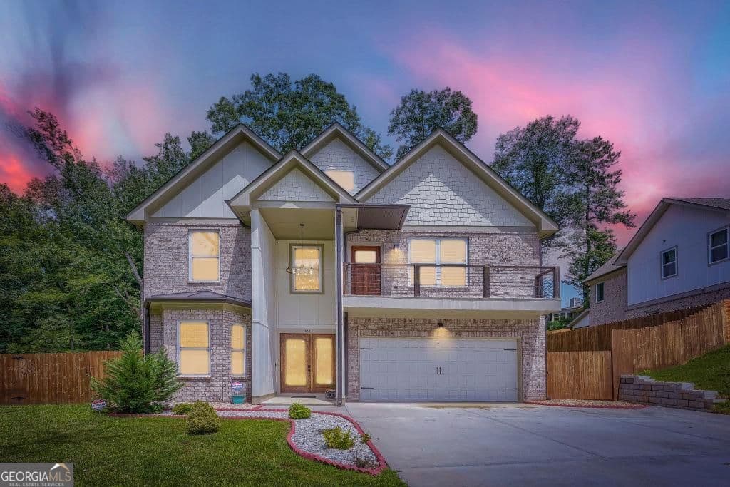 6 bedroom, 5 bathroom, 3,543 sq ft single family residence for sale at 658 Rockbridge Road, Lilburn, GA 30047 — photo 4