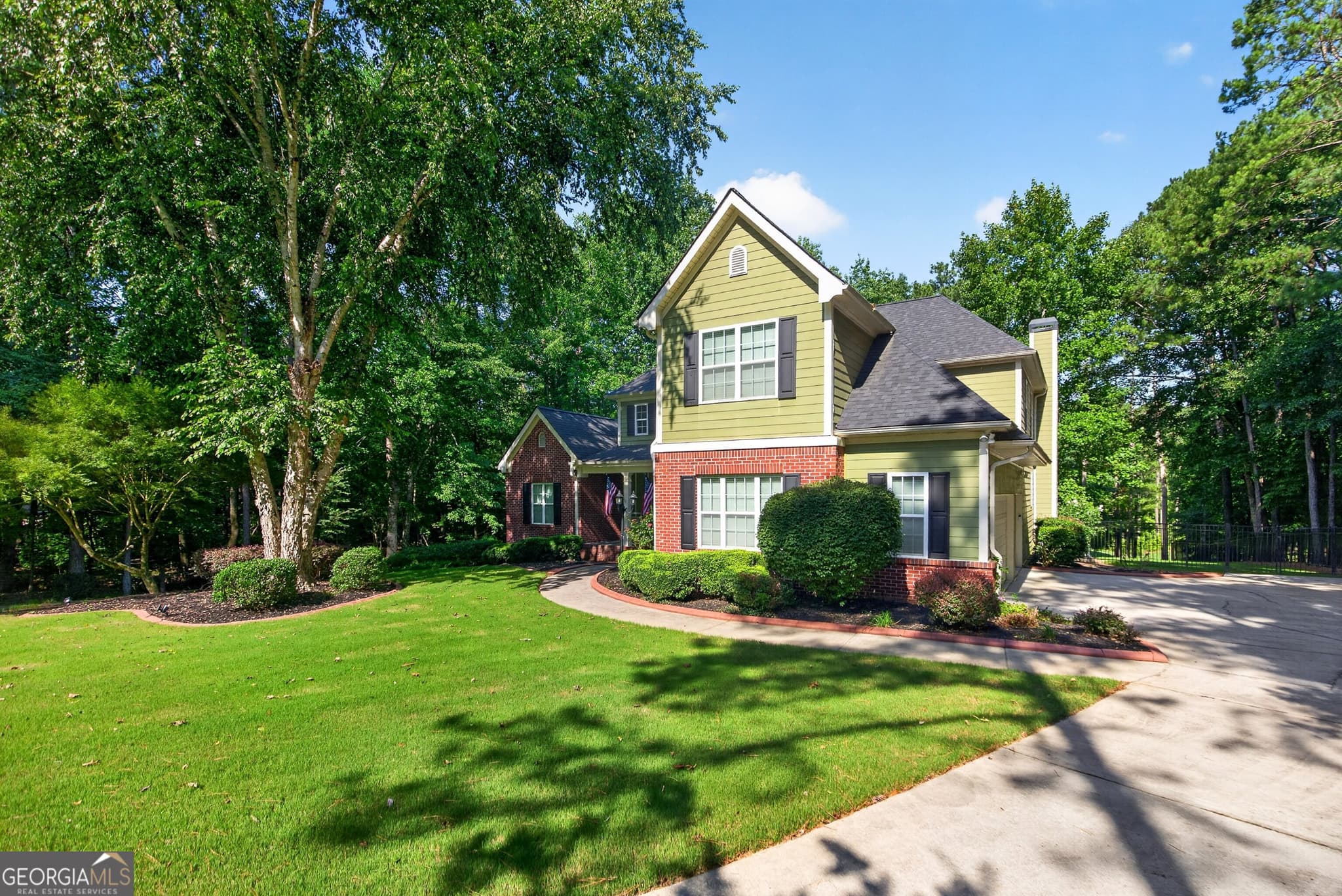 4 bedroom, 4.5 bathroom, 4,882 sq ft single family residence for sale at 135 Primrose Pass, Newnan, GA 30265 — photo 2