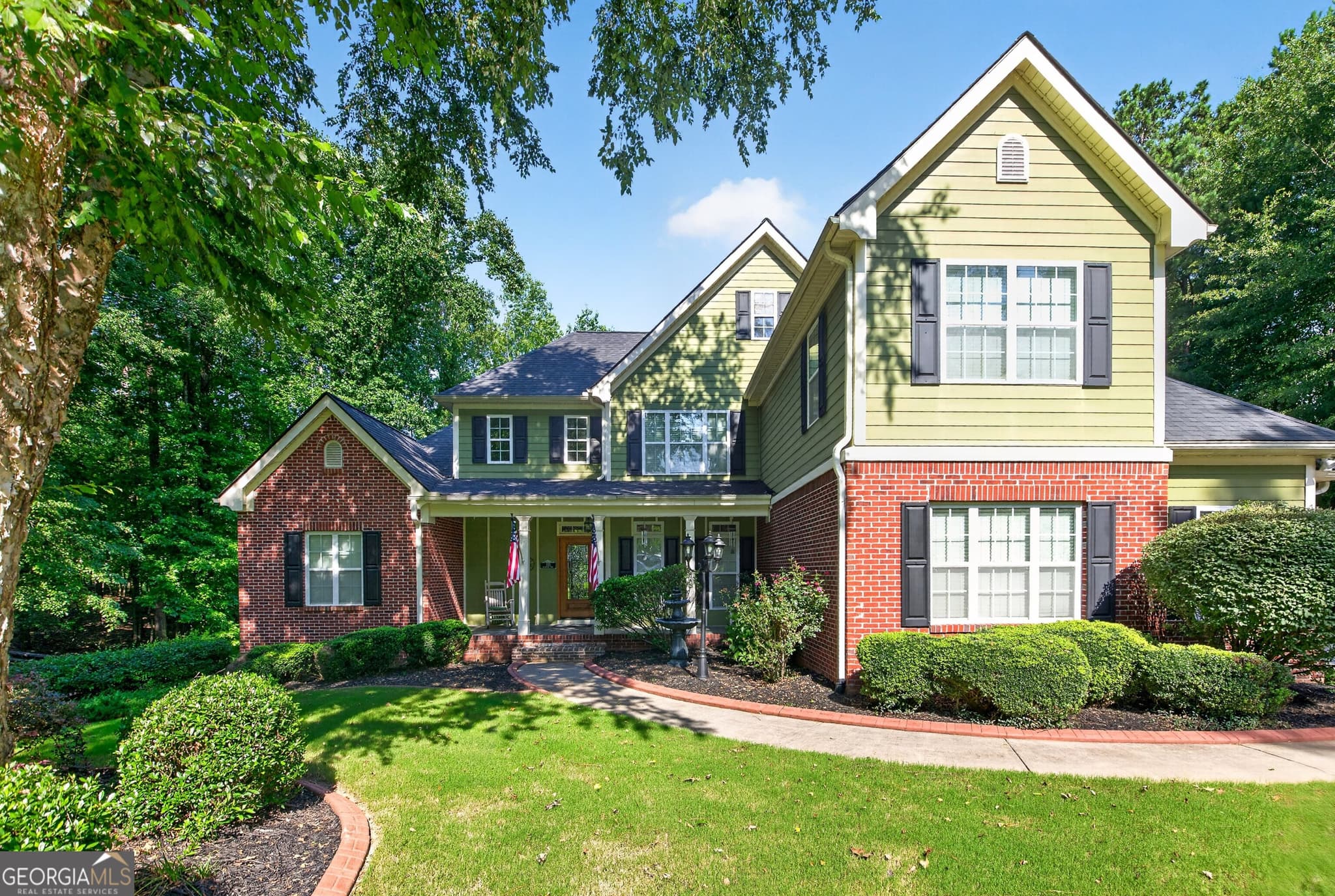 4 bedroom, 4.5 bathroom, 4,882 sq ft single family residence for sale at 135 Primrose Pass, Newnan, GA 30265 — photo 1 of 89