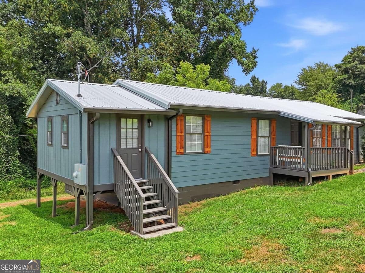 3 bedroom, 2 bathroom, 1,358 sq ft single family residence for sale at 165 Cherokee Avenue, Nelson, GA 30151 — photo 2