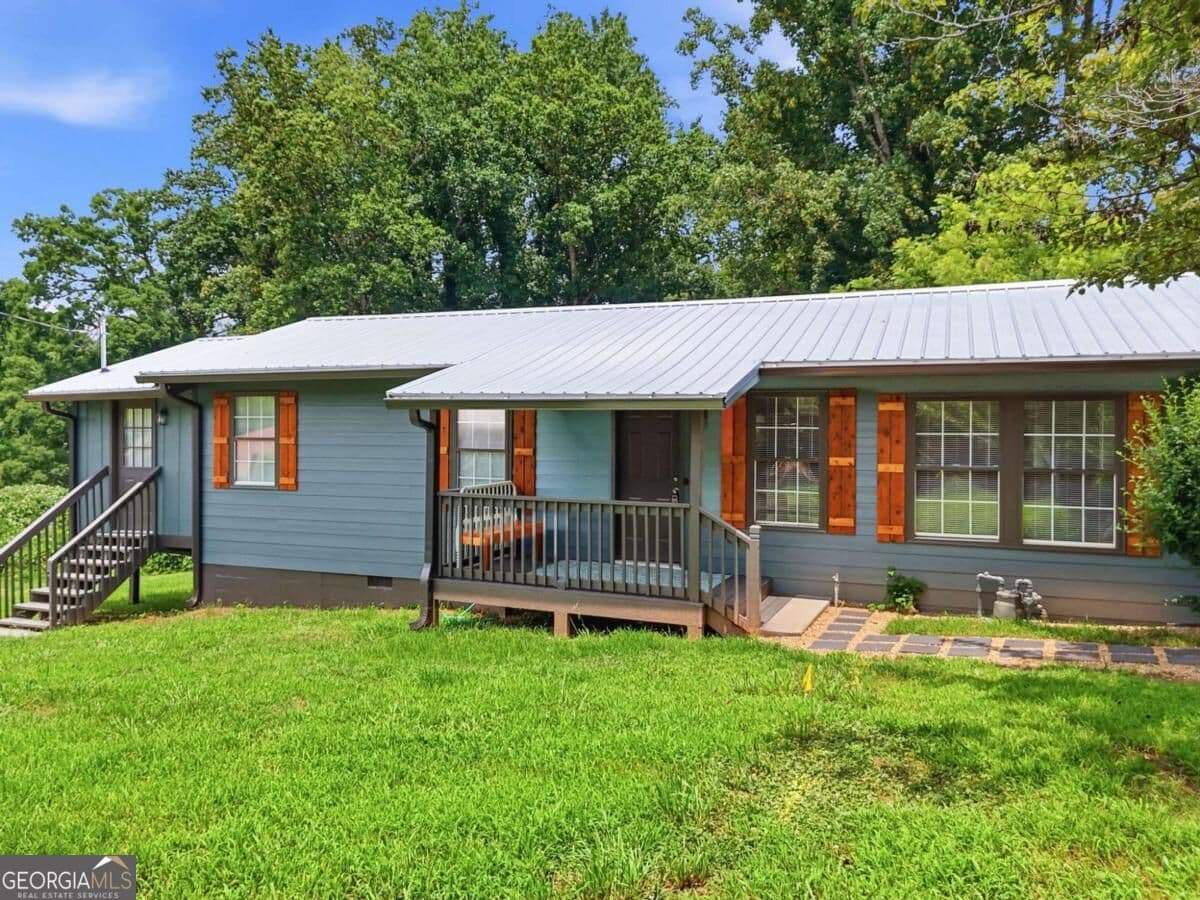 3 bedroom, 2 bathroom, 1,358 sq ft single family residence for sale at 165 Cherokee Avenue, Nelson, GA 30151 — photo 1 of 52