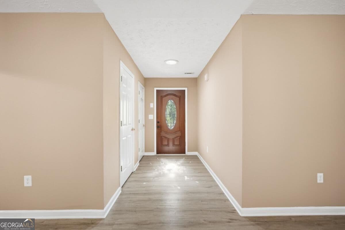 4 bedroom, 2 bathroom, 1,851 sq ft single family residence for sale at 2072 Amberly Crossing Lane, Dacula, GA 30019 — photo 2