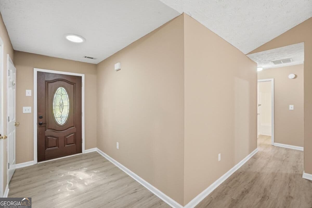 4 bedroom, 2 bathroom, 1,851 sq ft single family residence for sale at 2072 Amberly Crossing Lane, Dacula, GA 30019 — photo 3