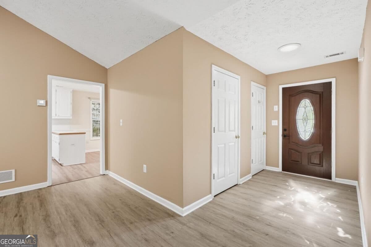 4 bedroom, 2 bathroom, 1,851 sq ft single family residence for sale at 2072 Amberly Crossing Lane, Dacula, GA 30019 — photo 4
