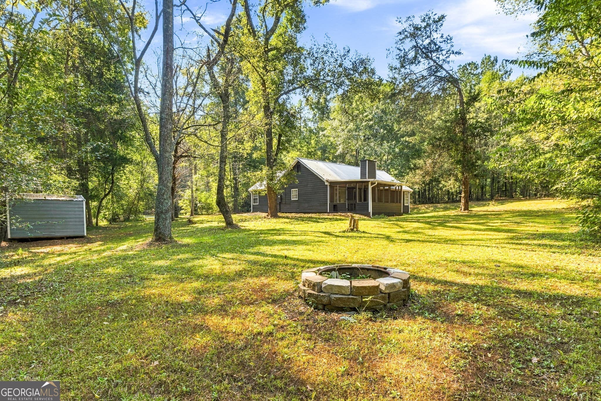 4 bedroom, 2 bathroom, 1,785 sq ft single family residence for sale at 1231 Old Jackson Road, Locust Grove, GA 30248 — photo 3