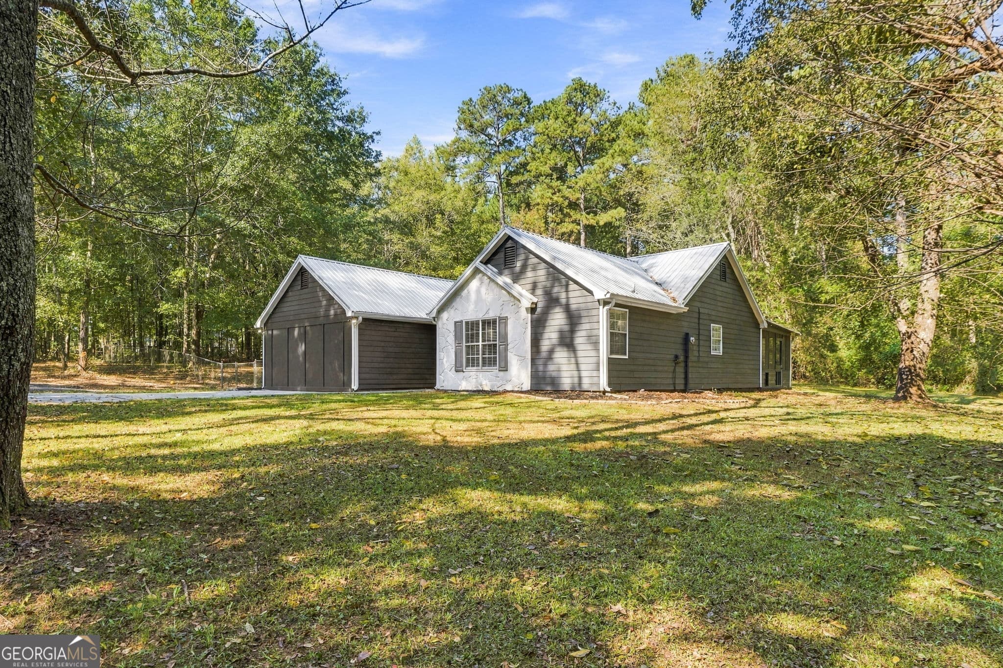 4 bedroom, 2 bathroom, 1,785 sq ft single family residence for sale at 1231 Old Jackson Road, Locust Grove, GA 30248