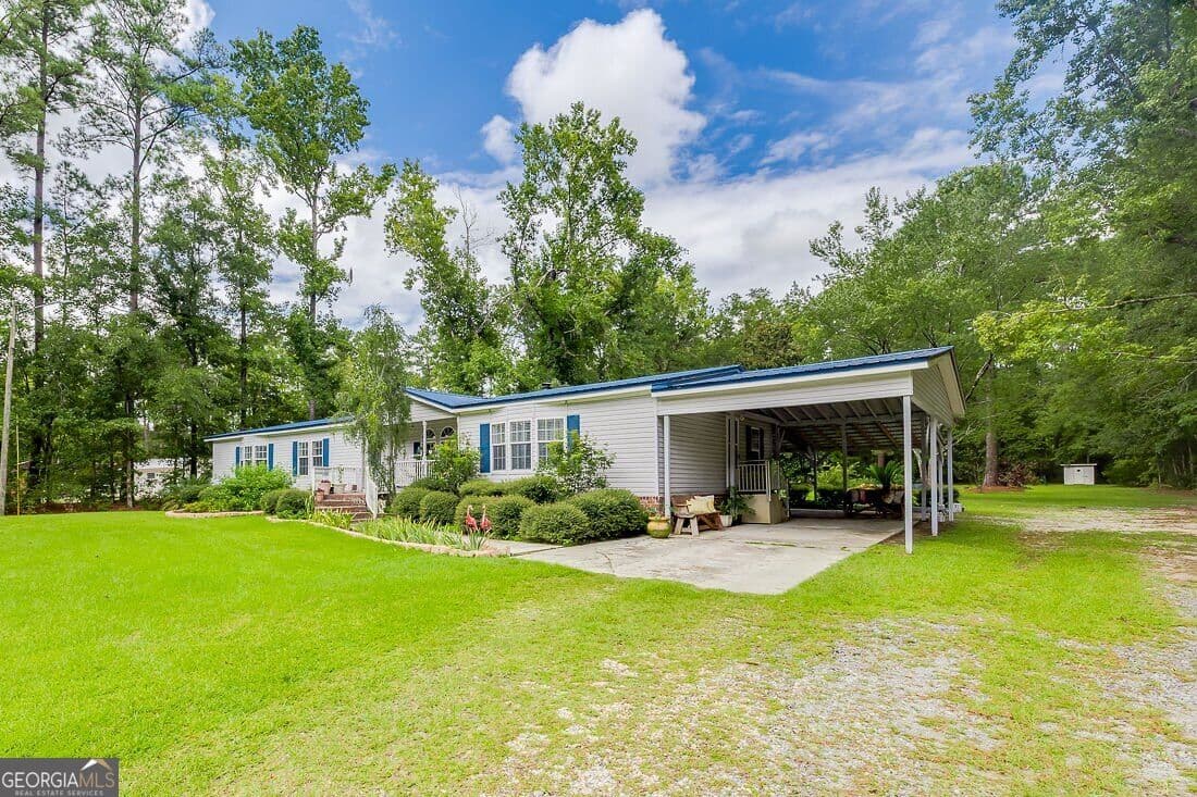 3 bedroom, 2 bathroom, 2,184 sq ft manufactured home,single family residence for sale at 3555 Noel C Conaway Road, Guyton, GA 31312 — photo 2