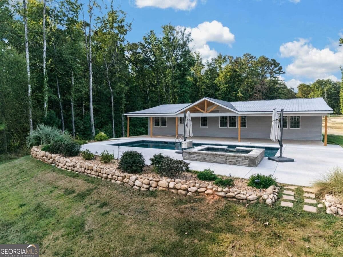 3 bedroom, 2 bathroom, 2,046 sq ft manufactured home,single family residence for sale at 105 Blue Branch Drive, Eatonton, GA 31024 — photo 1 of 35