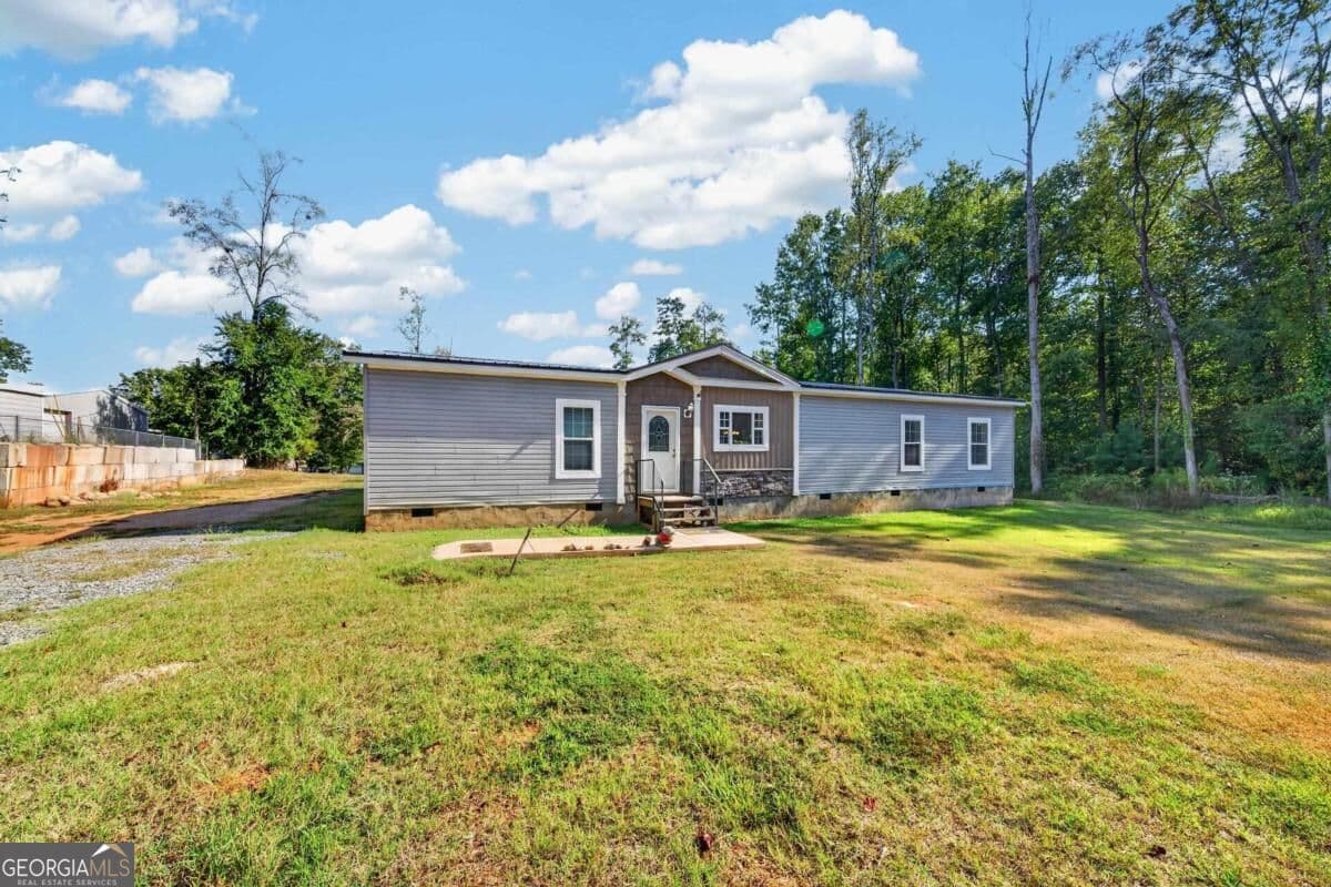 3 bedroom, 2 bathroom, 2,046 sq ft manufactured home,single family residence for sale at 105 Blue Branch Drive, Eatonton, GA 31024 — photo 4