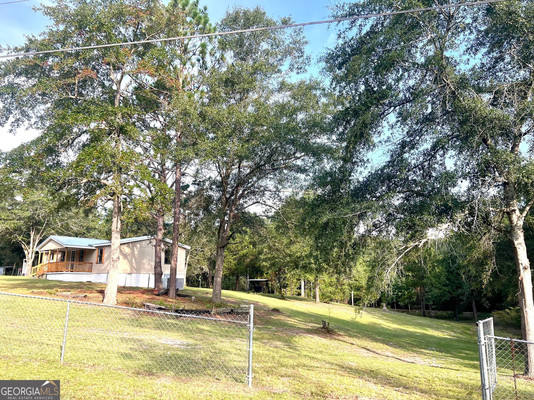 3 bedroom, 2 bathroom, 1,344 sq ft manufactured home,single family residence for sale at 85 Shady Oaks Road, Eastman, GA 31023 — photo 6