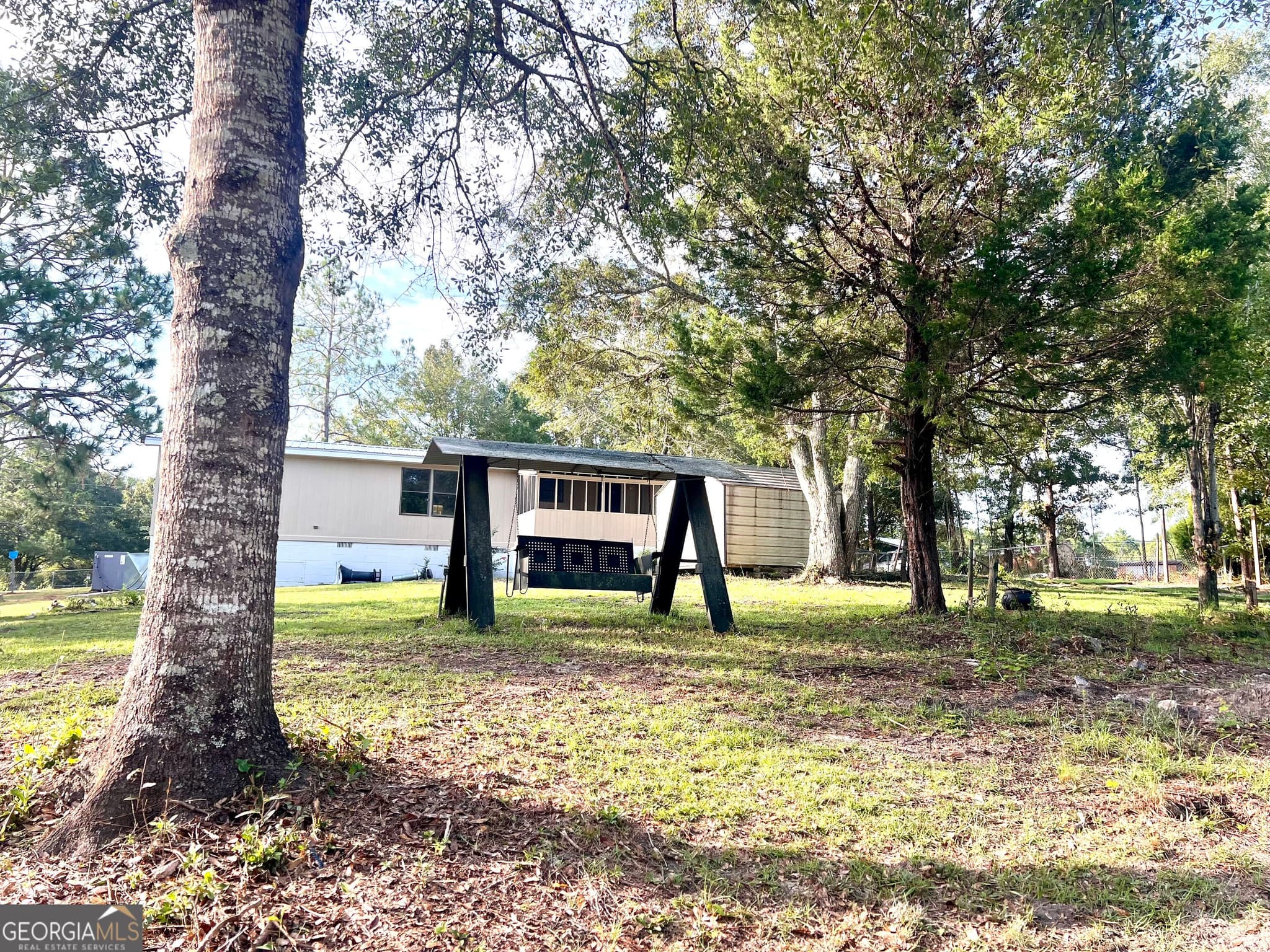 3 bedroom, 2 bathroom, 1,344 sq ft manufactured home,single family residence for sale at 85 Shady Oaks Road, Eastman, GA 31023 — photo 10