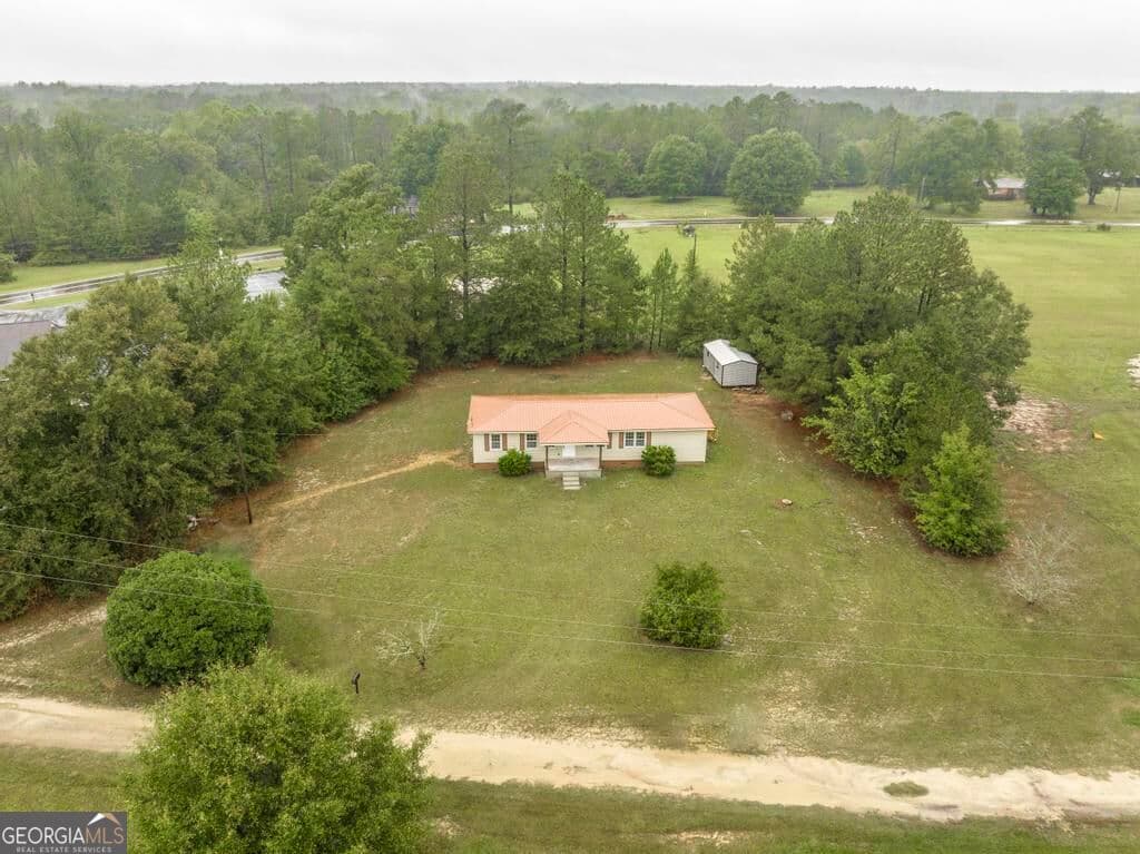 4 bedroom, 2 bathroom, 1,308 sq ft single family residence for sale at 1677 Millville Church Road, Dublin, GA 31021 — photo 1 of 46