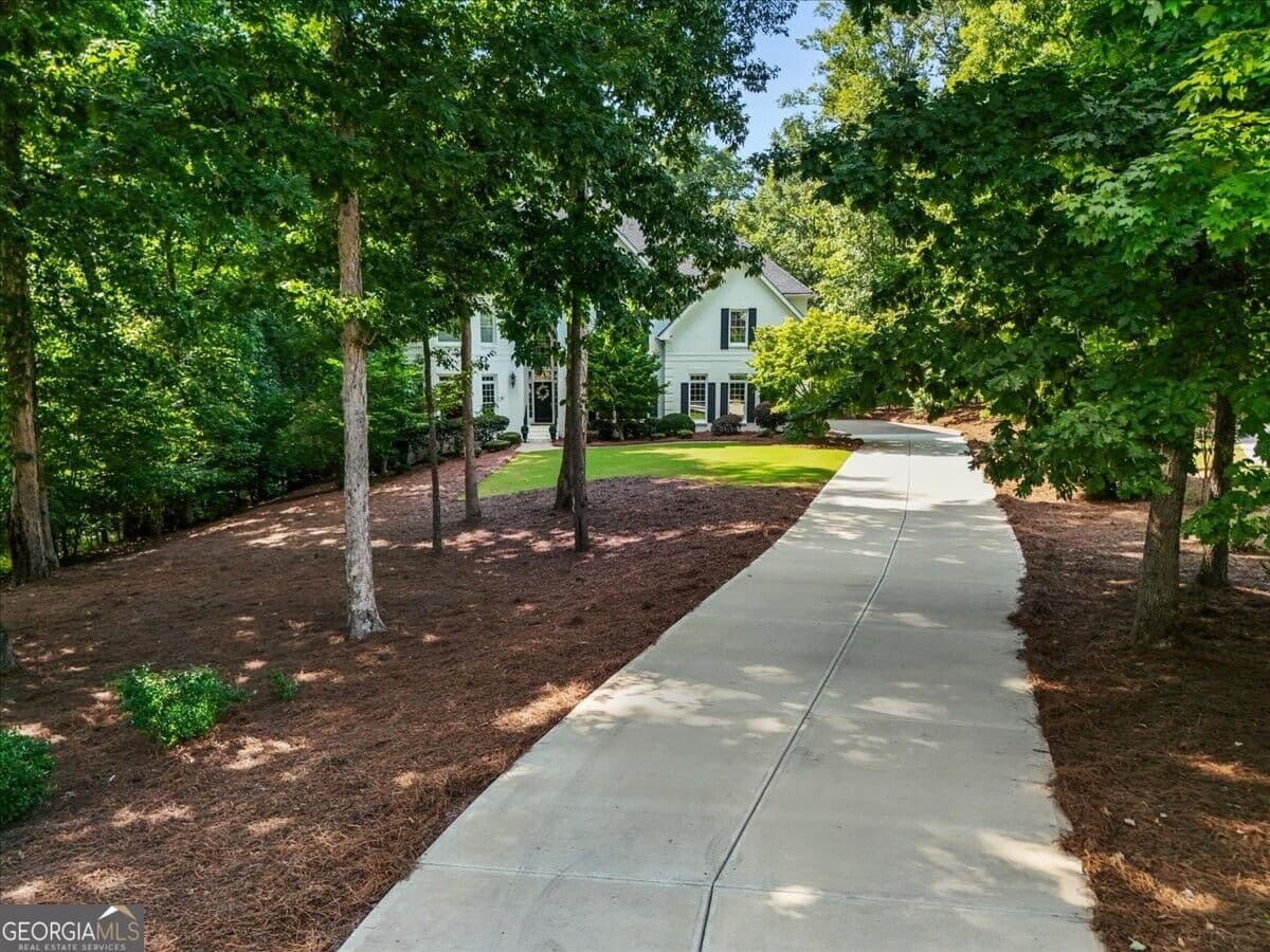 6 bedroom, 6.5 bathroom, 8,695 sq ft single family residence for sale at 15420 Little Stone Way, Milton, GA 30004 — photo 3