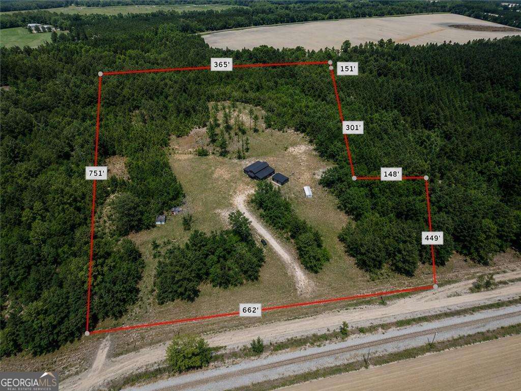 4 bedroom, 3 bathroom, 3,032 sq ft single family residence for sale at 8300 Ga Highway 17, Newington, GA 30446 — photo 3