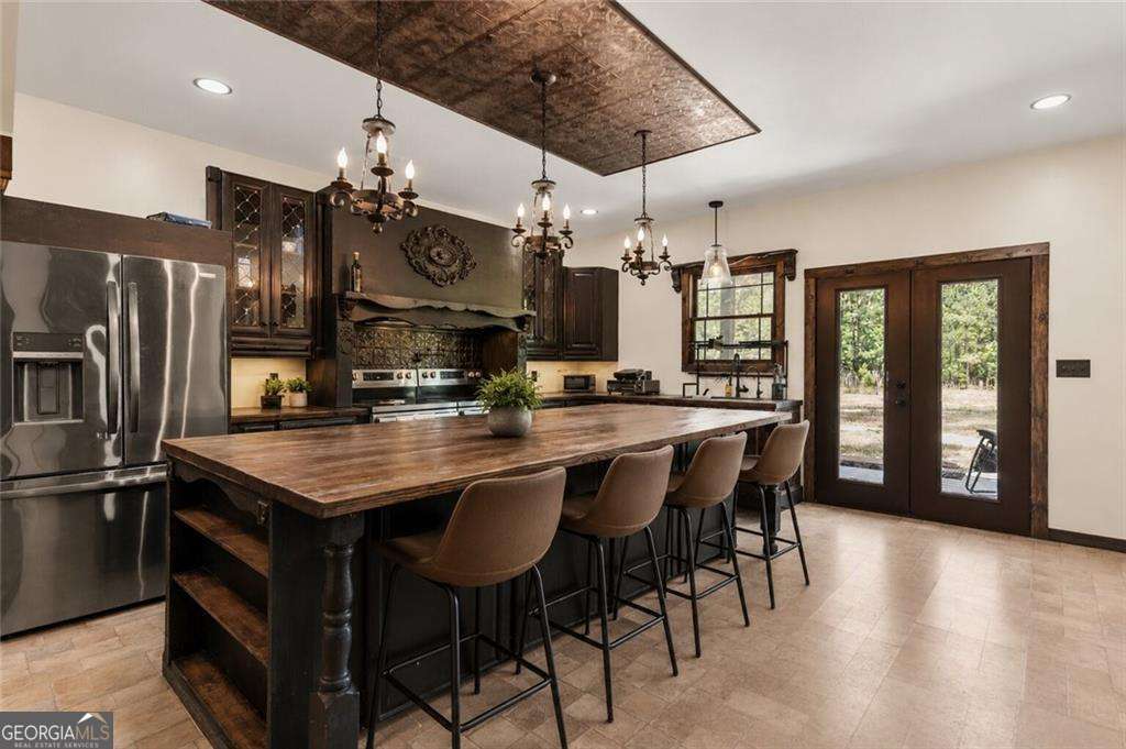 4 bedroom, 3 bathroom, 3,032 sq ft single family residence for sale at 8300 Ga Highway 17, Newington, GA 30446 — photo 4
