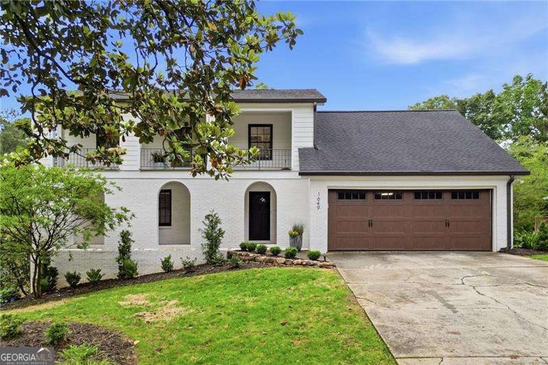 4 bedroom, 3.5 bathroom, 2,272 sq ft single family residence sold at 1649 Womack Road, Dunwoody, GA 30338