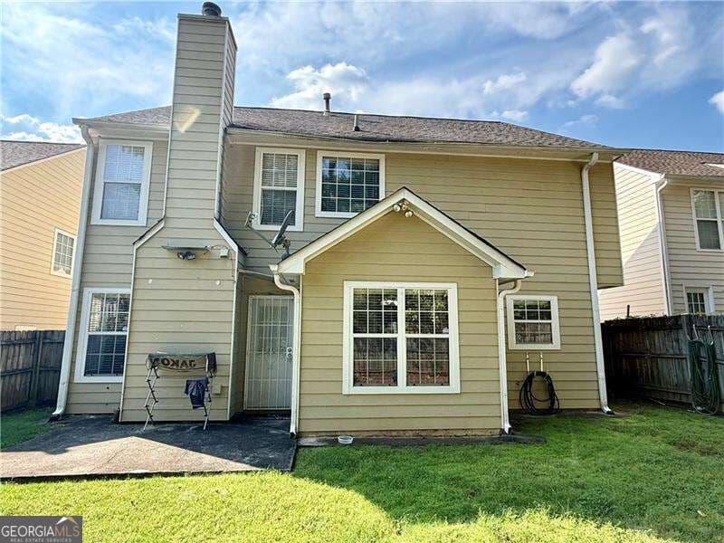 3 bedroom, 2.5 bathroom, 2,121 sq ft single family residence for sale at 5280 Harbins Point Lane, Lilburn, GA 30047 — photo 3