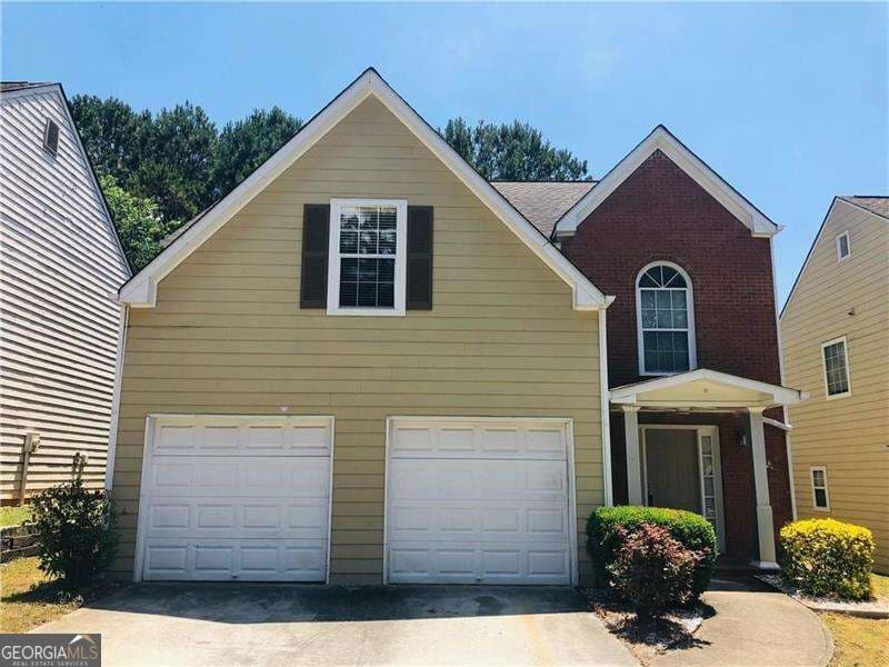 3 bedroom, 2.5 bathroom, 2,121 sq ft single family residence for sale at 5280 Harbins Point Lane, Lilburn, GA 30047