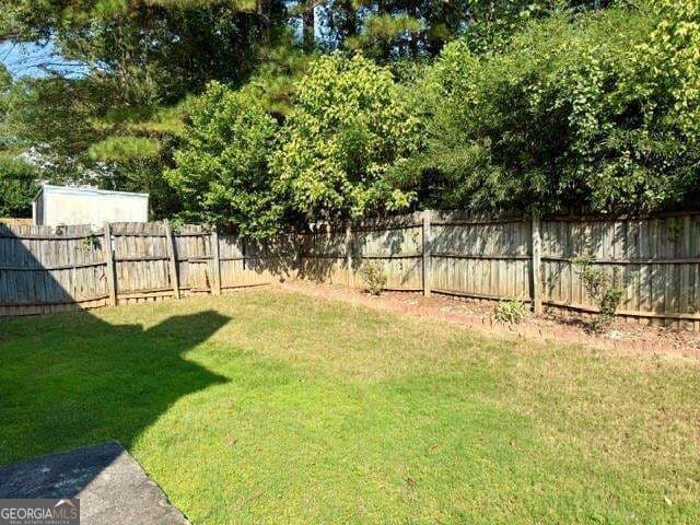 3 bedroom, 2.5 bathroom, 2,121 sq ft single family residence for sale at 5280 Harbins Point Lane, Lilburn, GA 30047 — photo 4