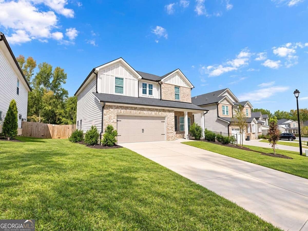 4 bedroom, 2.5 bathroom single family residence for sale at 3774 Commodore Court, Buford, GA 30519 — photo 2