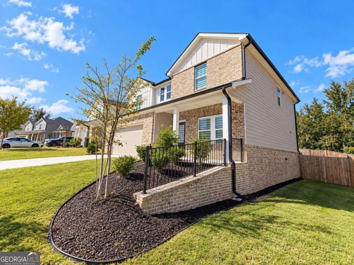 4 bedroom, 2.5 bathroom single family residence for sale at 3774 Commodore Court, Buford, GA 30519 — photo 3