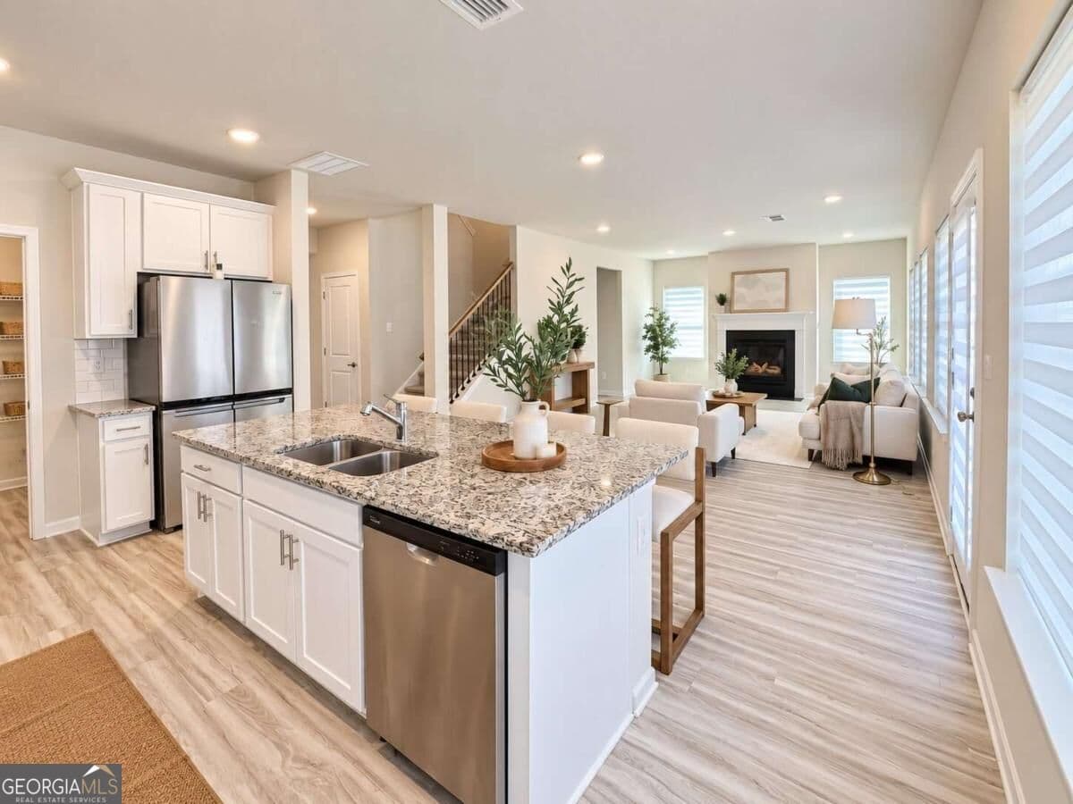 4 bedroom, 2.5 bathroom single family residence for sale at 3774 Commodore Court, Buford, GA 30519 — photo 8