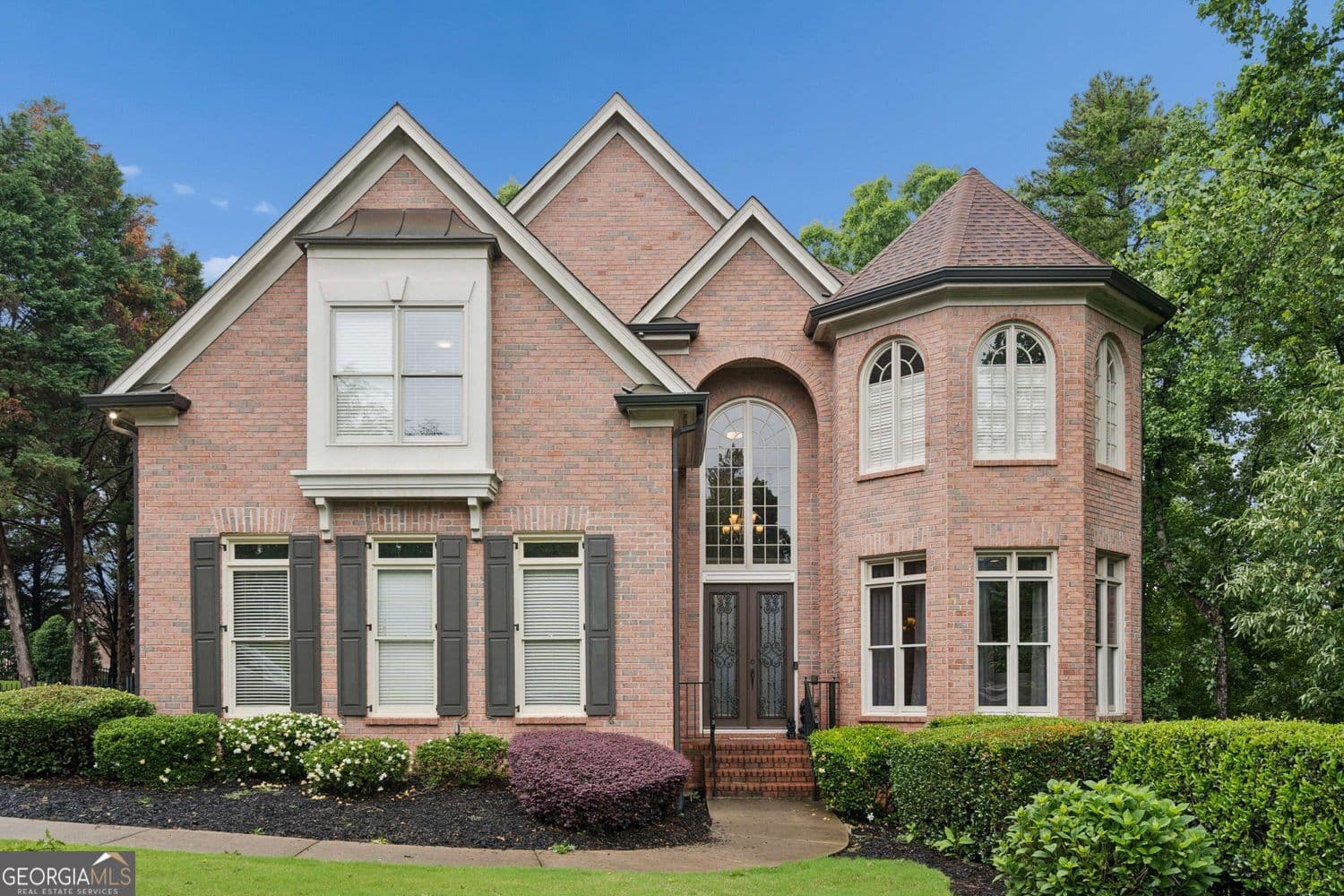 8 bedroom, 8.5 bathroom, 7,387 sq ft single family residence sold at 8925 Muirfield Court, Duluth, GA 30097