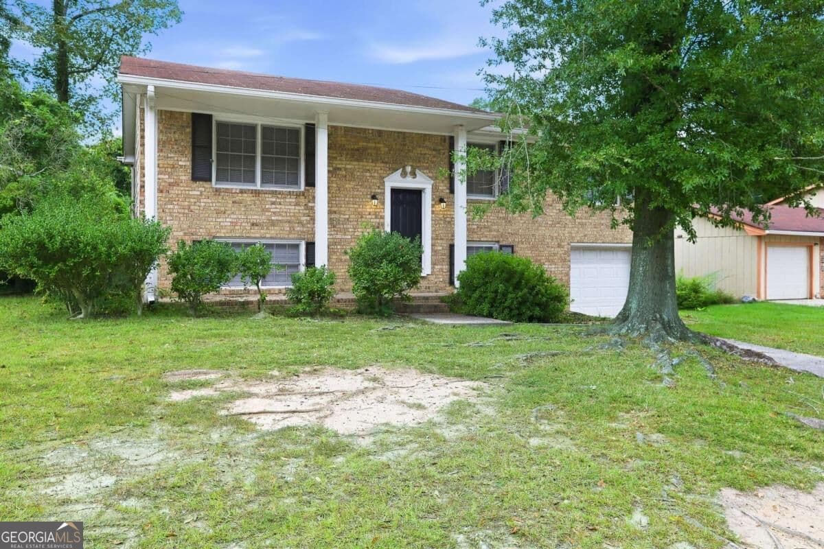 4 bedroom, 2 bathroom single family residence for rent at 6450 Ashdale Drive, Atlanta, GA 30349 for $2,020 a month — photo 2