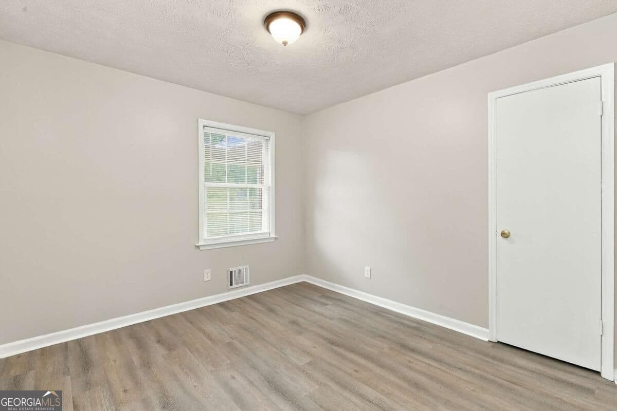 4 bedroom, 2 bathroom single family residence for rent at 6450 Ashdale Drive, Atlanta, GA 30349 for $2,020 a month — photo 7