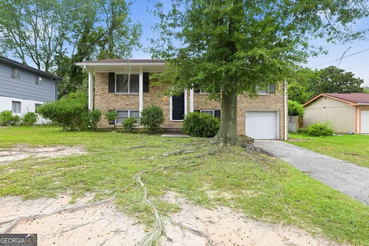 4 bedroom, 2 bathroom single family residence for rent at 6450 Ashdale Drive, Atlanta, GA 30349 for $2,020 a month — photo 1 of 17