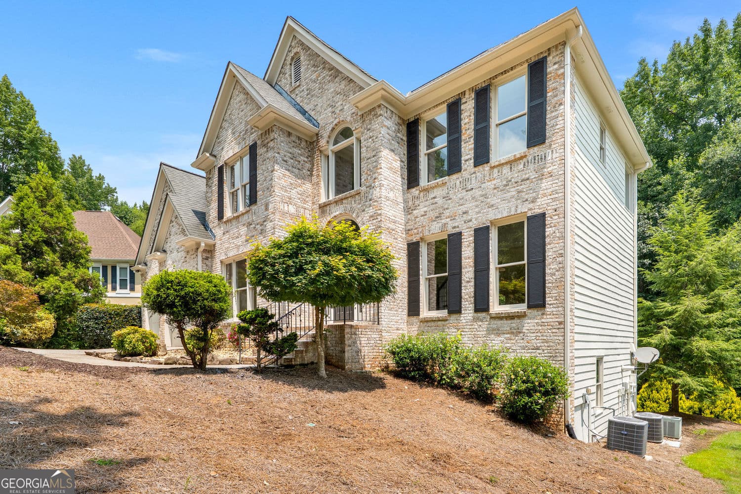 6 bedroom, 4 bathroom, 4,448 sq ft single family residence for sale at 10795 Cauley Creek Drive, Johns Creek, GA 30097 — photo 2