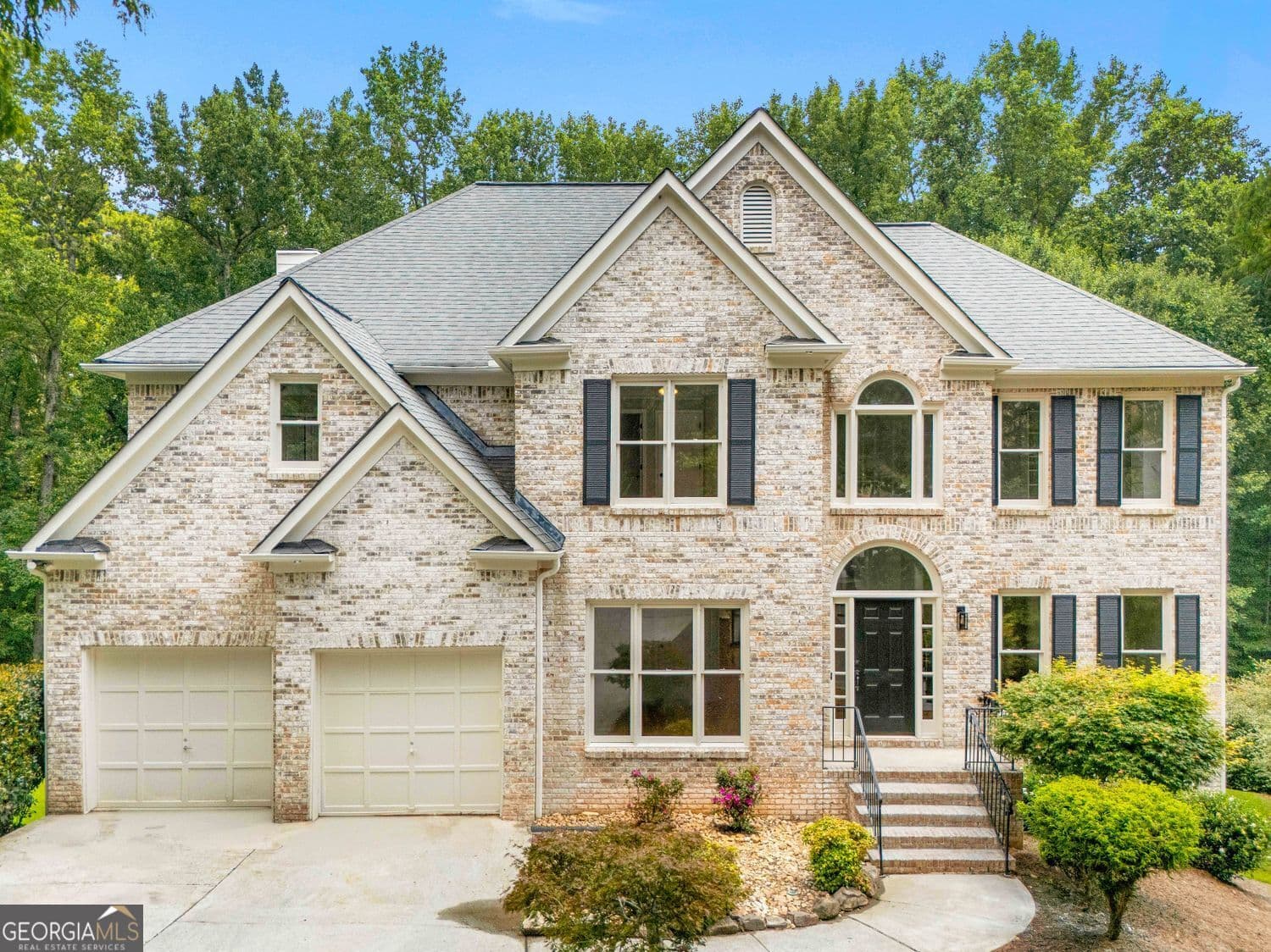 6 bedroom, 4 bathroom, 4,448 sq ft single family residence for sale at 10795 Cauley Creek Drive, Johns Creek, GA 30097