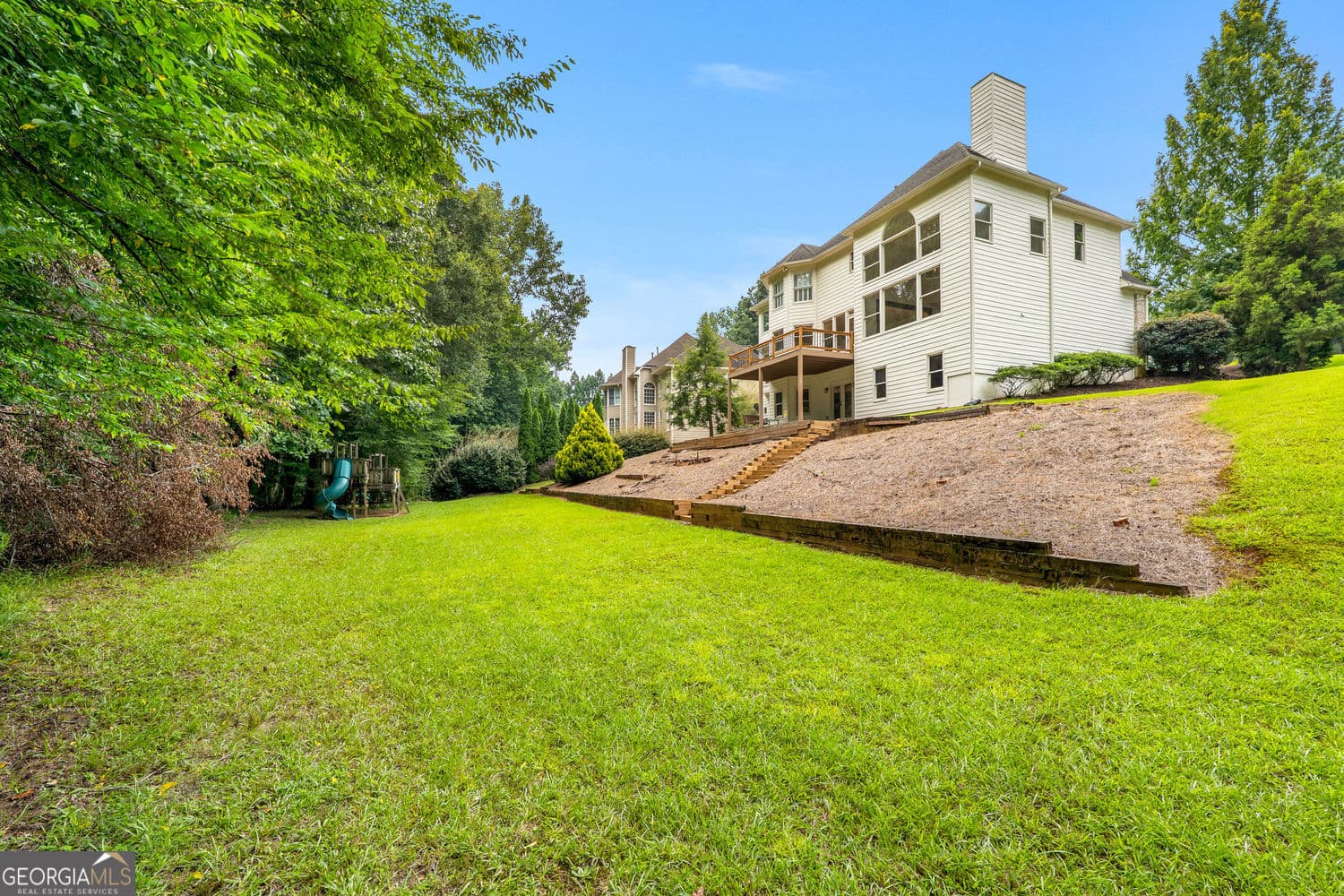 6 bedroom, 4 bathroom, 4,448 sq ft single family residence for sale at 10795 Cauley Creek Drive, Johns Creek, GA 30097 — photo 4