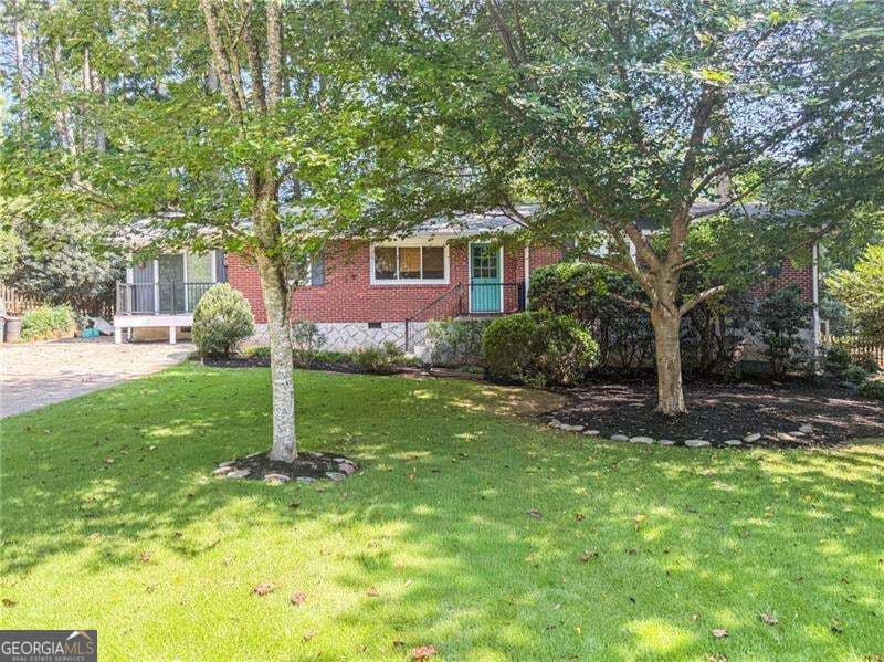 3 bedroom, 2.5 bathroom, 1,785 sq ft single family residence for sale at 1170 N Druid Woods Court, Decatur, GA 30033 — photo 1 of 60