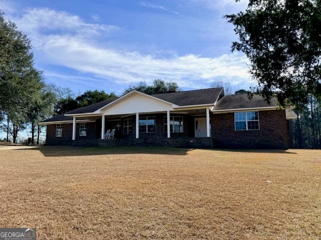 4 bedroom, 3 bathroom, 2,982 sq ft single family residence for sale at 1431 Community Road, Glennville, GA 30427 — photo 2