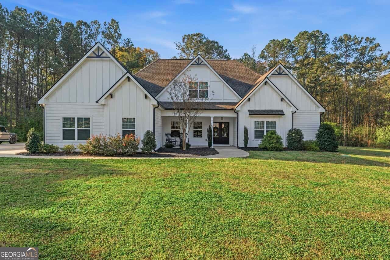 5 bedroom, 4 bathroom, 3,662 sq ft single family residence for sale at 1058 Lawshe Road, Senoia, GA 30276 — photo 2