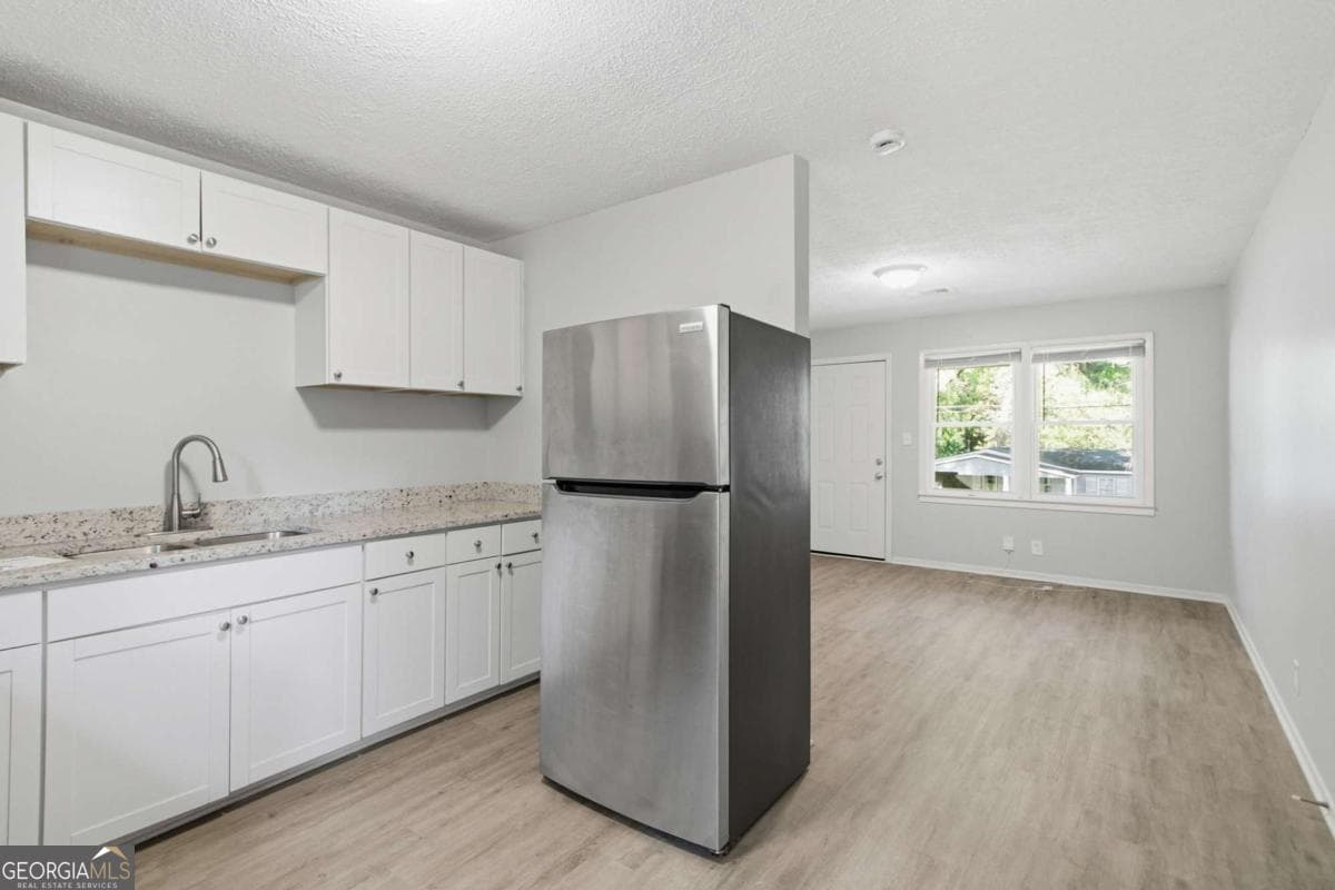 3 bedroom, 1 bathroom, 884 sq ft single family residence for sale at 4813 Bartlett Road, Forest Park, GA 30297 — photo 6