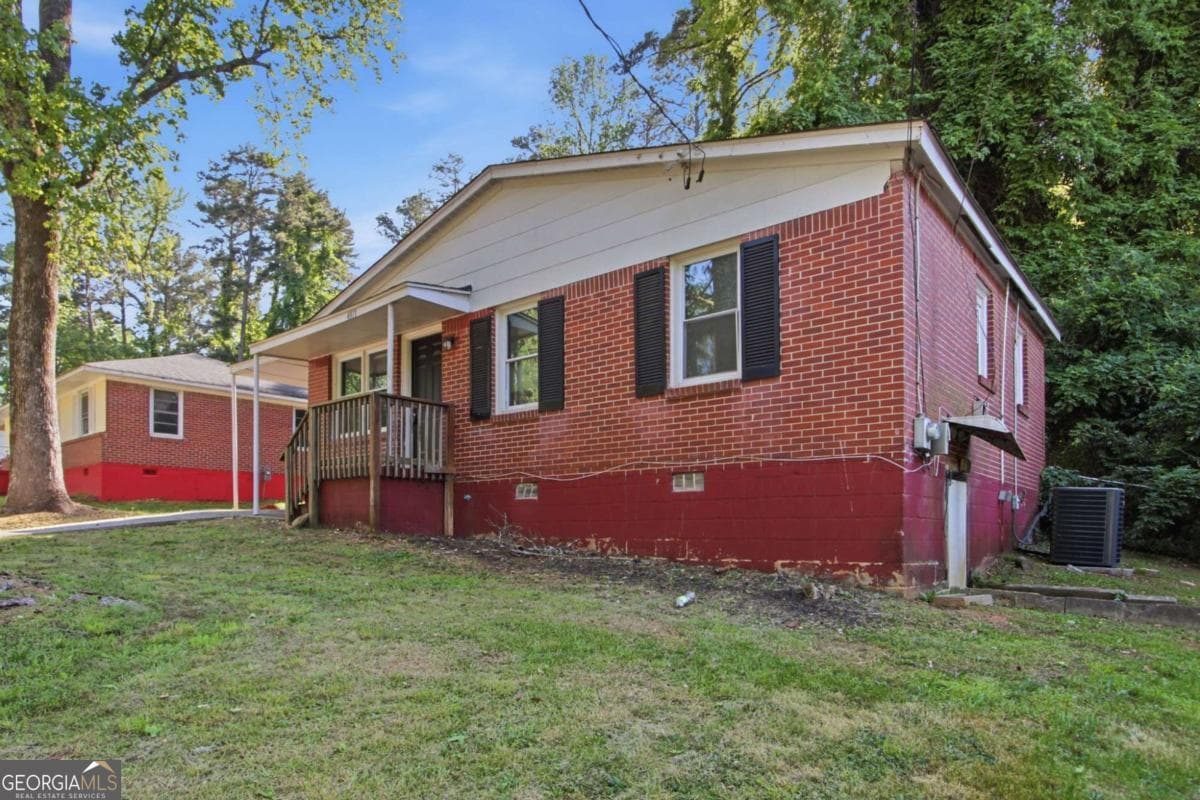 3 bedroom, 1 bathroom, 884 sq ft single family residence for sale at 4813 Bartlett Road, Forest Park, GA 30297 — photo 3