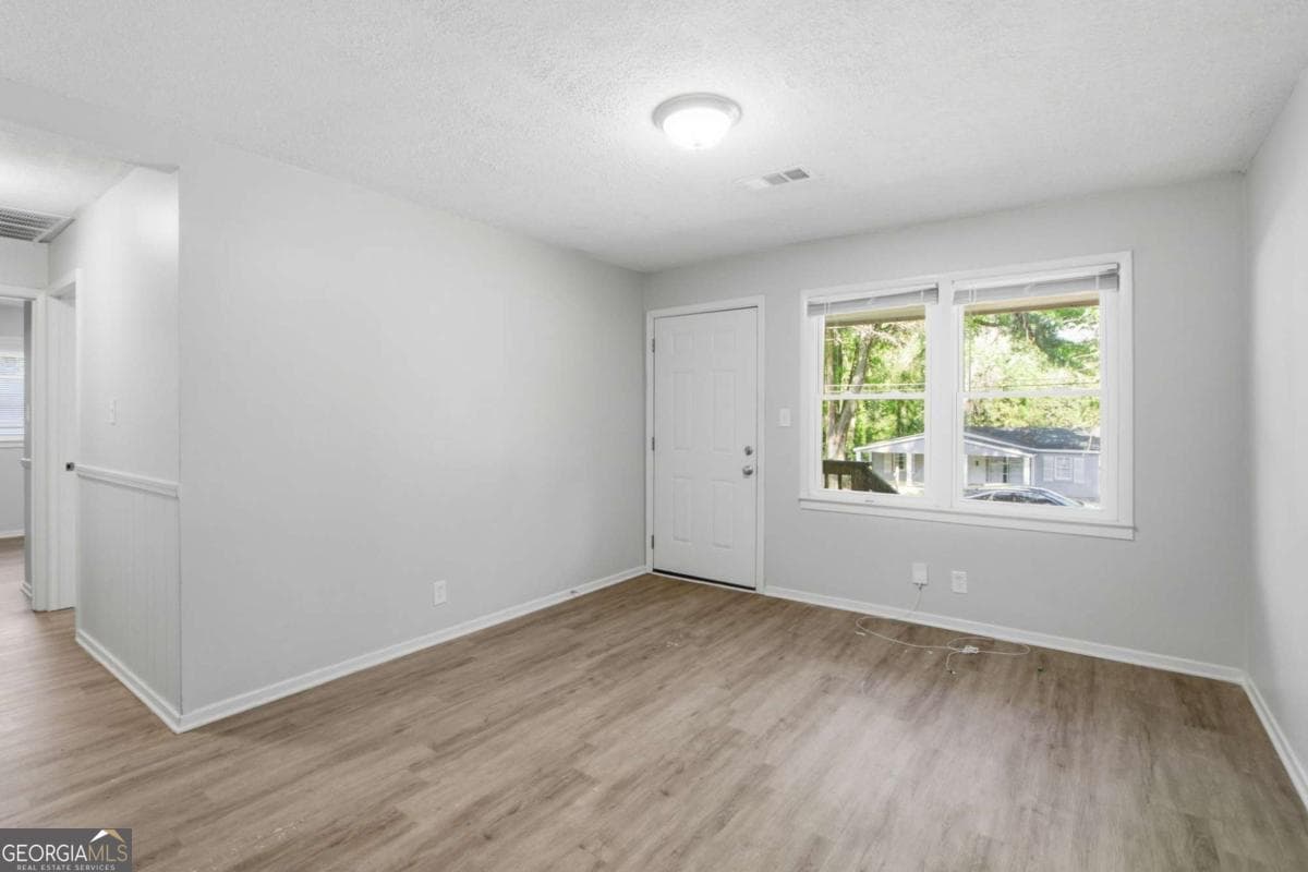 3 bedroom, 1 bathroom, 884 sq ft single family residence for sale at 4813 Bartlett Road, Forest Park, GA 30297 — photo 4