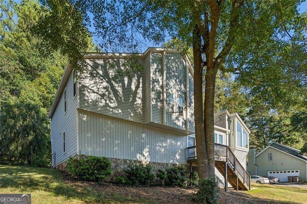 4 bedroom, 4 bathroom, 3,630 sq ft single family residence for sale at 587 Farmbrook Trail, Kennesaw, GA 30144 — photo 2