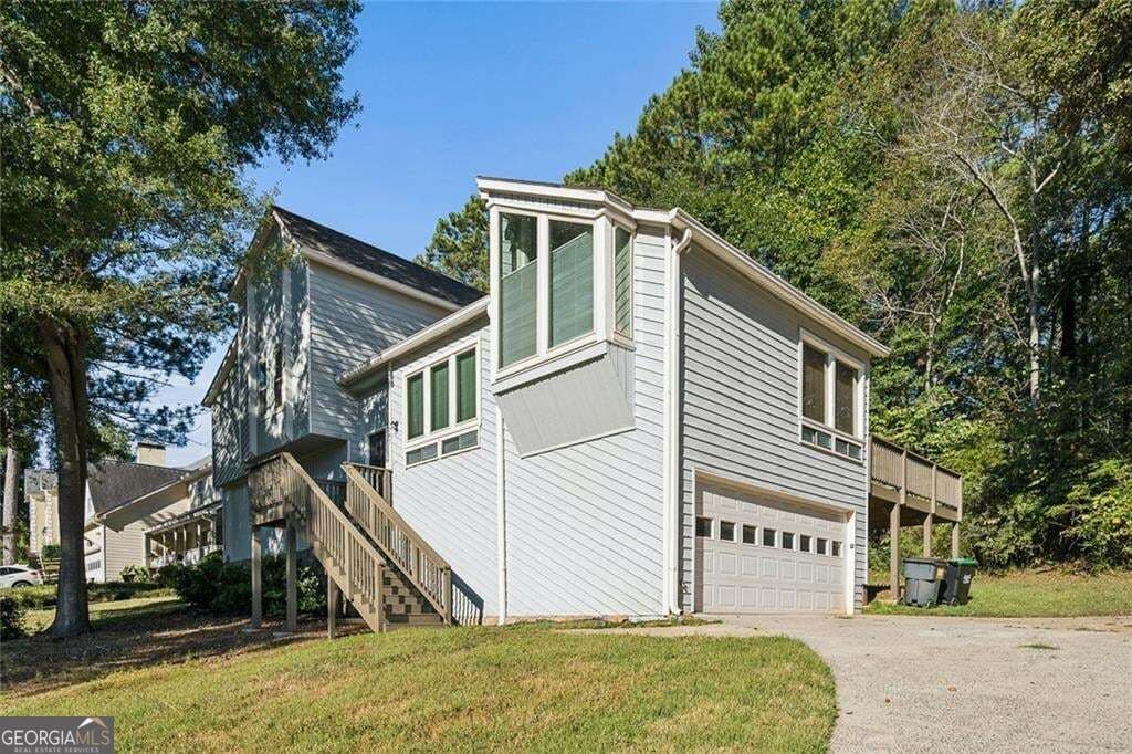 4 bedroom, 4 bathroom, 3,630 sq ft single family residence for sale at 587 Farmbrook Trail, Kennesaw, GA 30144 — photo 3