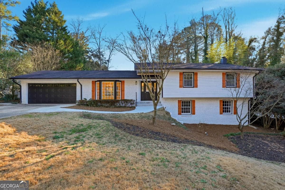 4 bedroom, 3 bathroom, 2,678 sq ft single family residence for sale at 2437 Flair Knoll Drive, Atlanta, GA 30345 — photo 2