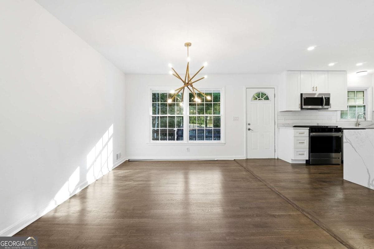4 bedroom, 3 bathroom, 2,678 sq ft single family residence for sale at 2437 Flair Knoll Drive, Atlanta, GA 30345 — photo 7