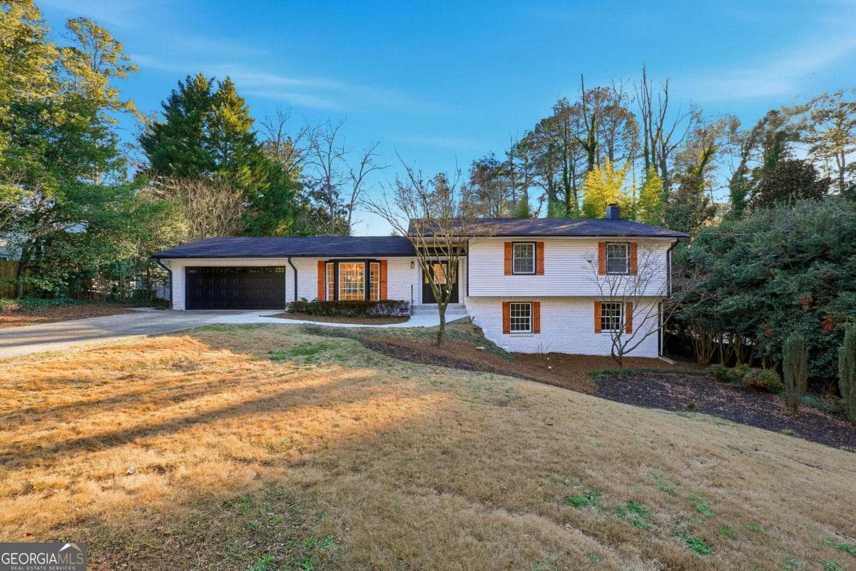 4 bedroom, 3 bathroom, 2,678 sq ft single family residence for sale at 2437 Flair Knoll Drive, Atlanta, GA 30345 — photo 1 of 24